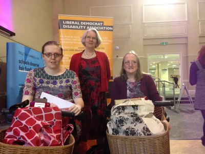 Baroness Judith Jolly, with Claire and Gemma Roulston, at the LDDA stall at Southport conference